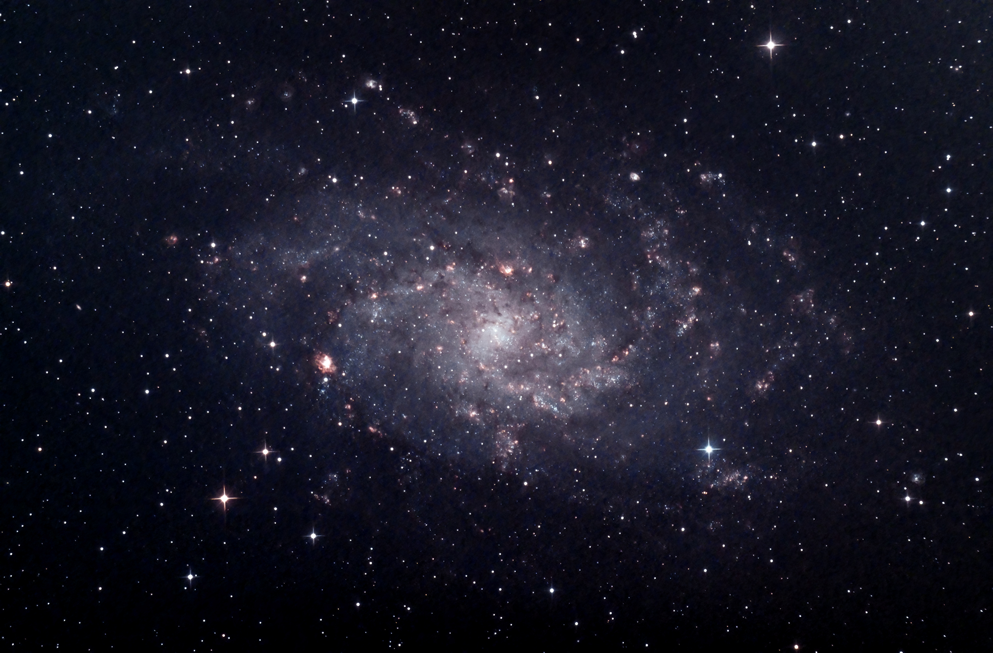 M33 tri-band (Mark Phillips) Only a small window available to take this. Narrowband brings out the emission regions and clusters well I think. 250mm f4.8 Newtonian QHY168C @-15°C Altair Astro tri-band filter 14x300s subs, darks, flats, dark-flats Captured in NINA Processed in APP and Photoshop