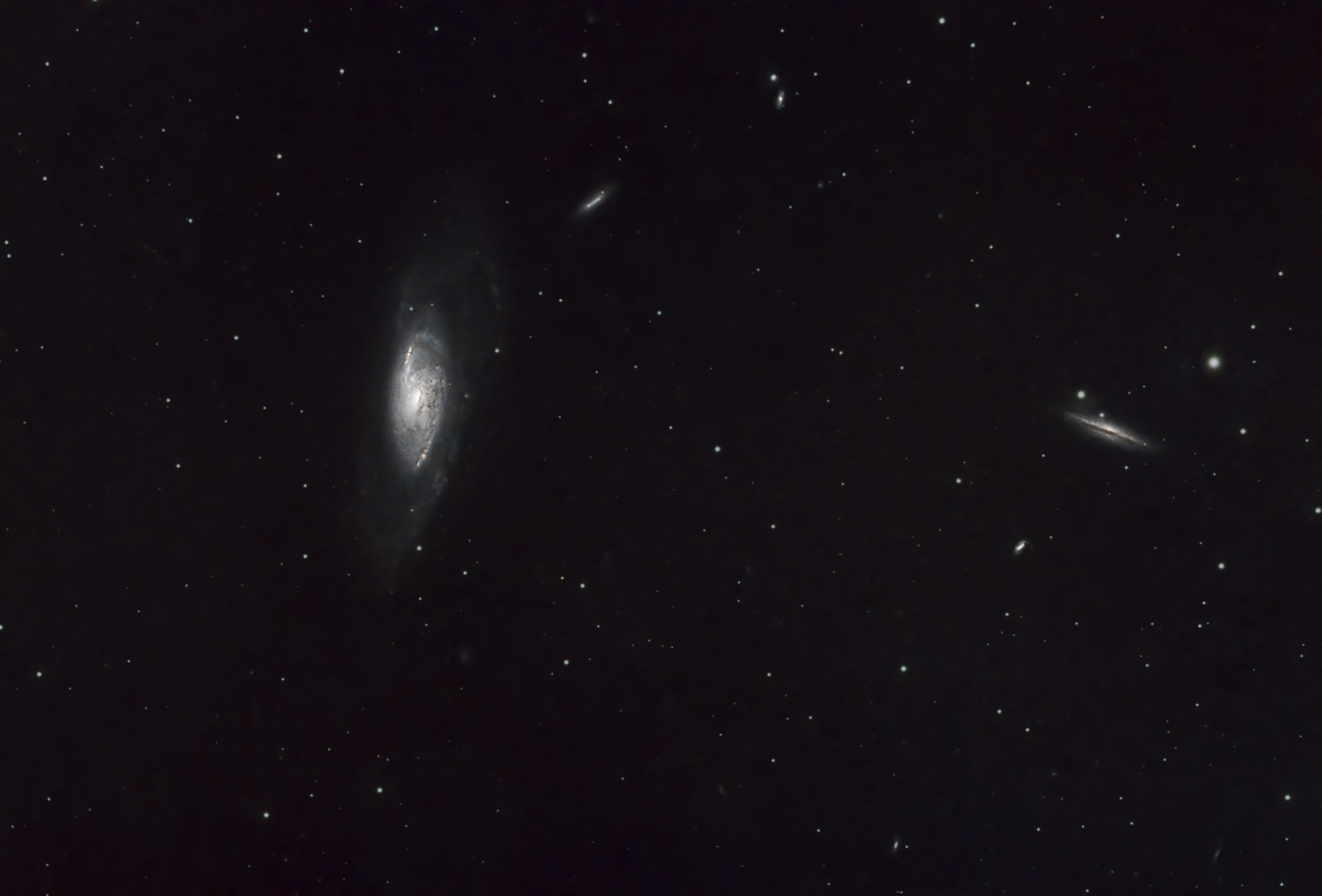M106 & NGC4217 Plus Many Other Galaxies (Ian A Smith) Skywatcher 190MN, NEQ6 mount, Altair Tri-|Band filter, ASI294MC Pro at -20C. 19 x 5 minute exposures (1 hour 35 minutes ) at Gain 120, Offset 30, 50 dark frames, 50 flat fields and 50 dark flat frames. Processed in Pixinsight Topaz denoise and Photoshop. Collected between 1:05 and 2:40 on the 17th of March, 2022. Lots of thin cloud illuminated by a bright moon.