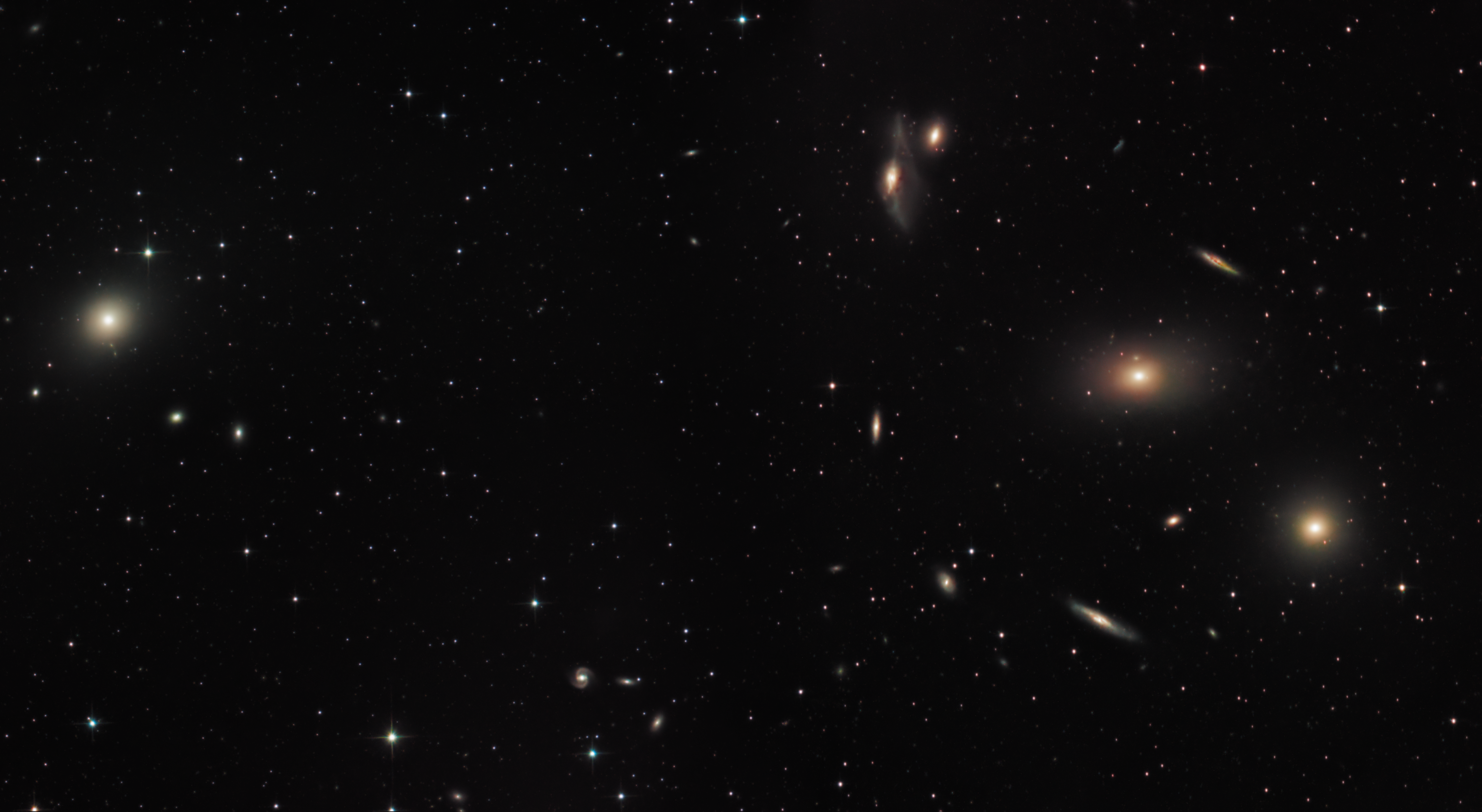 M84 Galxaxy (Markarians Chain) - from the "DHST" ( David Harvey) Data 25th Feb. 2023 2 panel Mosaic 40 Lights 5mins each. Straight forward OSC RGB with a twist "zero" gain. L-Pro filter Telescope Ts-photon 6" f/4, Mount Ioptron GEM45NUC Camera ASI533MC. gain "0" offset 40 Pre process APP, post StarTools/Affinity Photo.